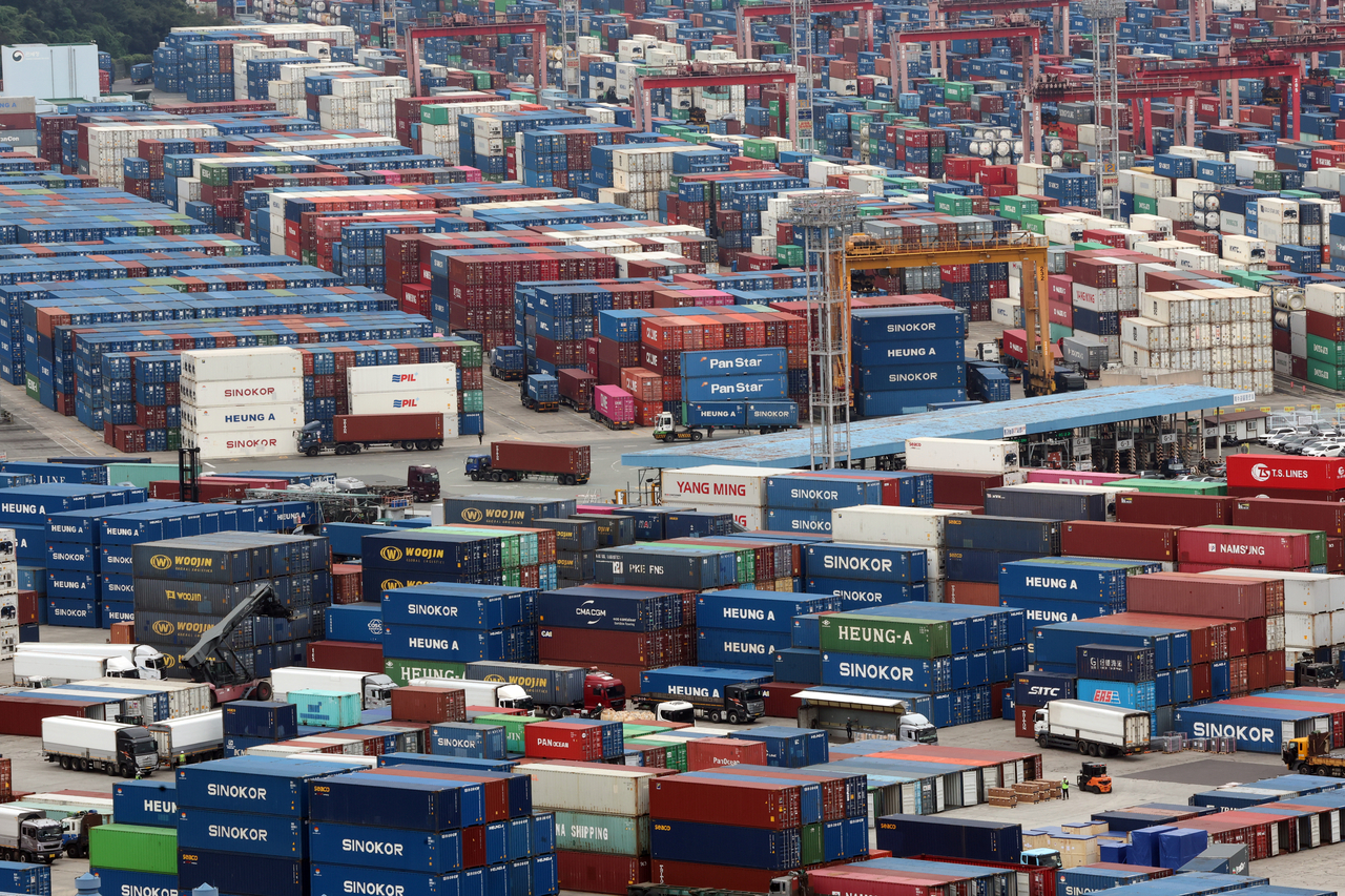 Export and import cargo stacked at Sinseondae Pier in Busan Port. [Yonhap]