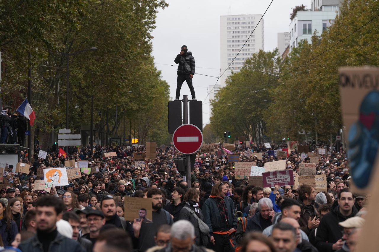 Protesters march during a demonstration against rising living costs in Paris, Saturday. (AP-Yonhap)