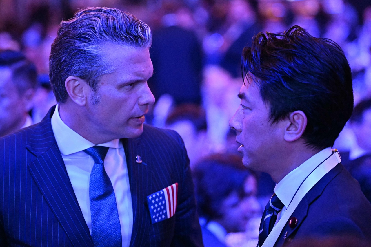 US Secretary of Defense Pete Hegseth and Japanese Defense Minister Koizumi Shinjiro [AFP]