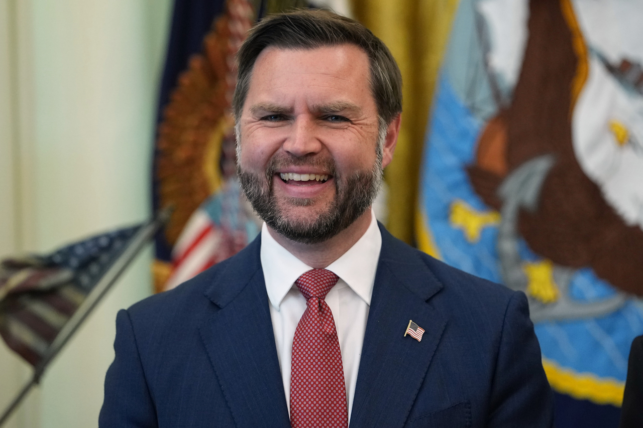 Vice President JD Vance smiles as President Donald Trump speaks in the Oval Office at the White House in Washington on Monday (local time). [AP]
