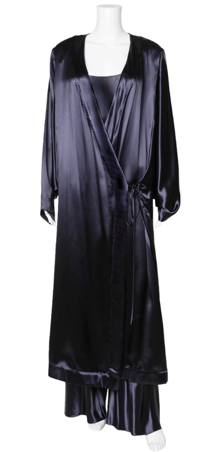 A limited-edition three-piece set in navy satin from The Row is priced at $3,400. (The Row)