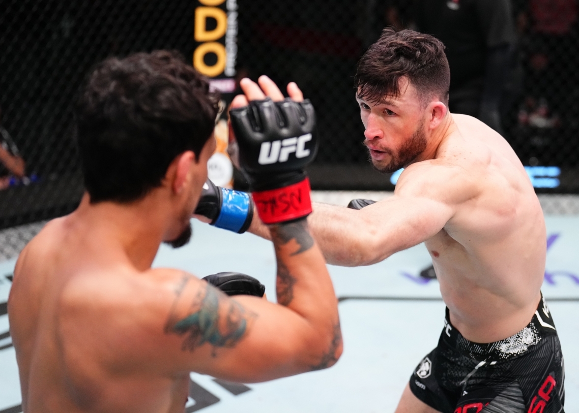 Julian Erosa (right) throws a punch against Ricardo Ramos. Erosa has announced he will retire after his bout with Lee Jung-young. [UFC]