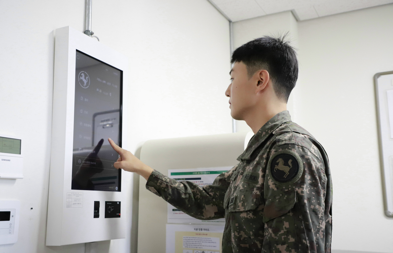 A soldier demonstrates the use of a smart-unit kiosk system at the 9th Infantry Division in Goyang, Gyeonggi Province, on Wednesday. (Republic of Korea Army)