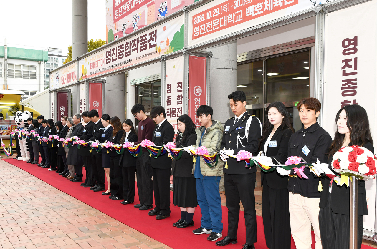 A ribbon-cutting ceremony marks the opening of the 2026 Yeungjin Comprehensive Works Exhibition at Baekho Gymnasium on the Yeungjin University campus on Thursday. [Yeungjin University]