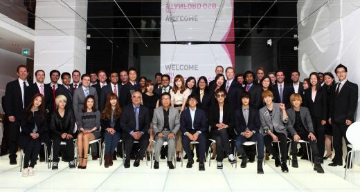 SM Entertainment CEO Lee Soo-man (front row, center) and his son on the right (SM Entertainment)