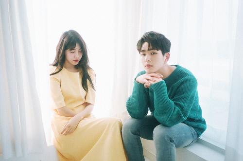 Member Onew of South Korean boy band SHINee (right) and member Roco of indie-duo Rocoberry (SM Entertainment)