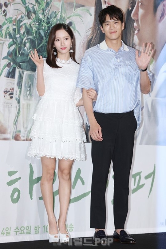 Bona of WJSN (keft) and actor Ha Seok-jin pose for photos at Conrad Seoul in Yeouido, western Seoul on Monday afternoon. (Herald DB)